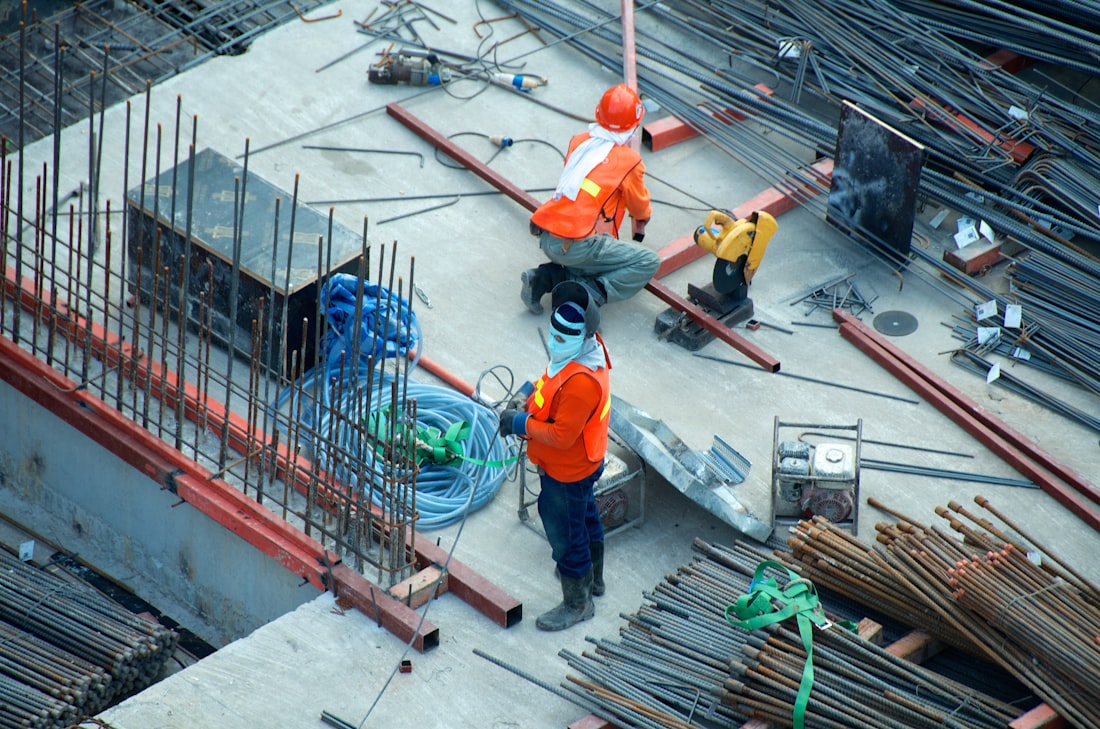 A skilled-trades apprentice at work on a construction site